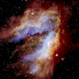 Composite image of the Swan Nebula in blue, green and red.